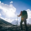 back packer hiking in winter